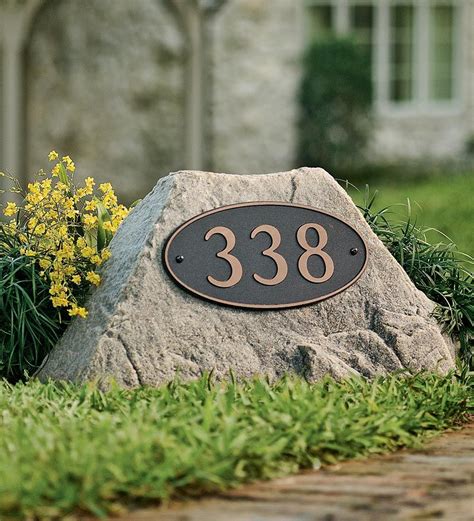 rock house number sign